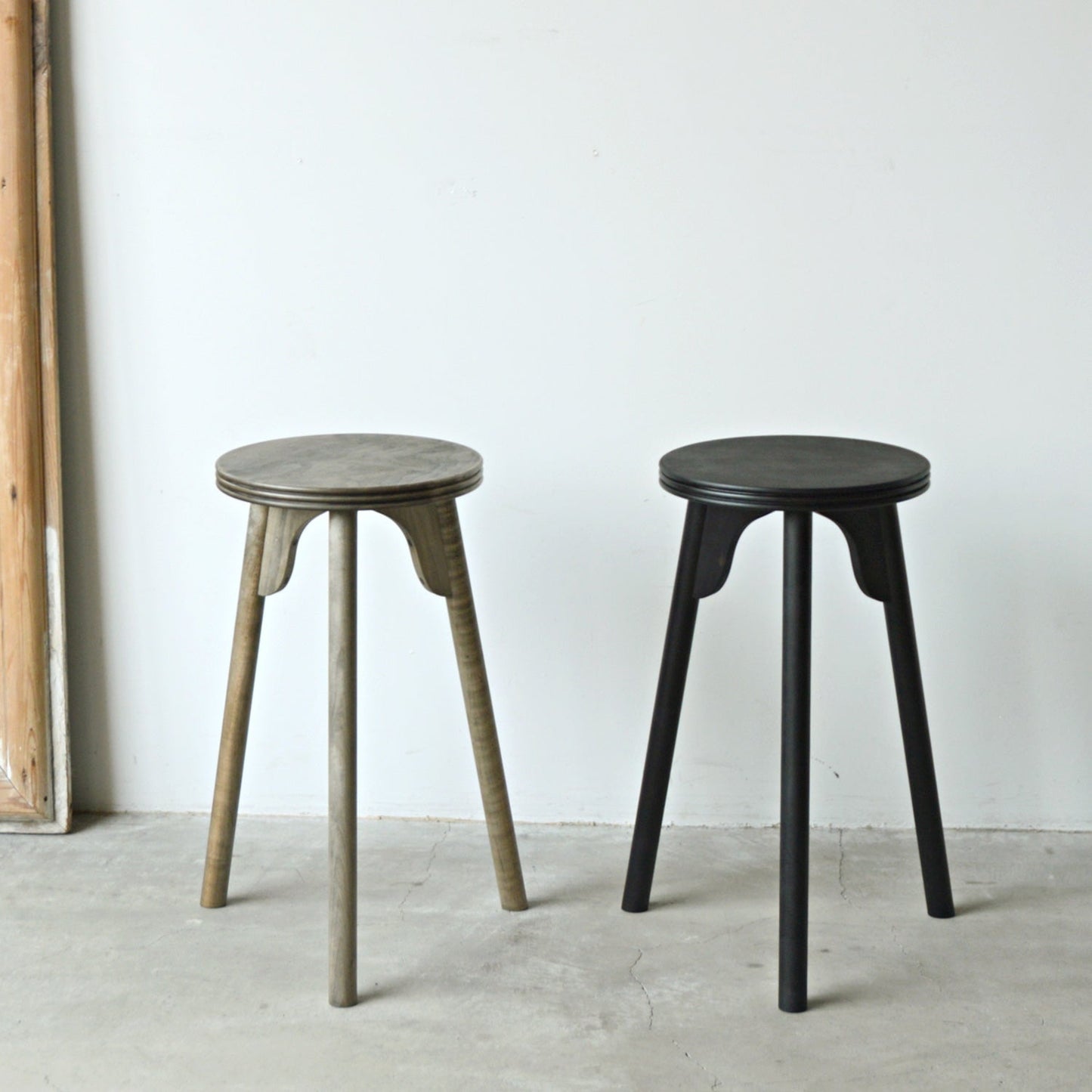 THREE-LEGGED STOOL